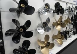 Various boat propellers on display
